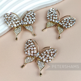 3 Gold Metal Butterfly Brooch Pins covered in Set Diamante